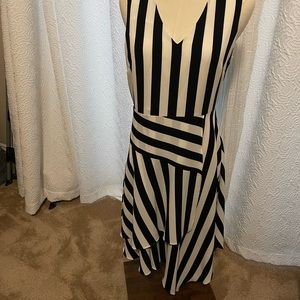 Vince Camuto Handkerchief dress. Flowy and fitted at the waist. Size 6